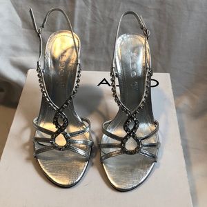 Like new silver stilettos